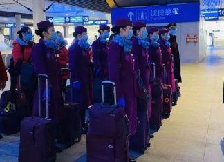 Chinese cities recovering from coronavirus fight for workers